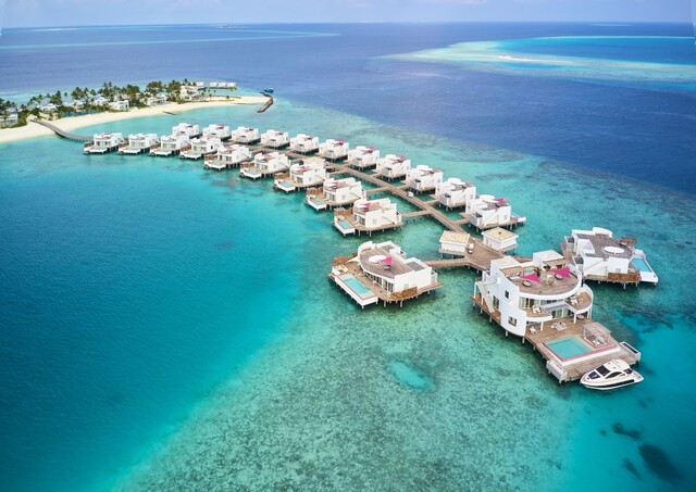 Family arriving at a tropical resort
